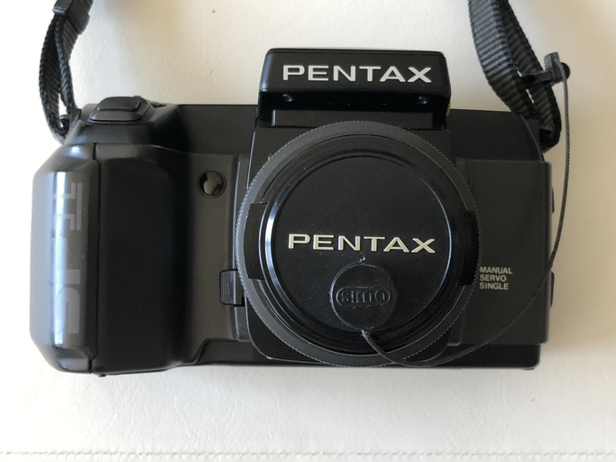 Pentax SF1 film camera with lens - Photo 2 view in Downtown Manhattan