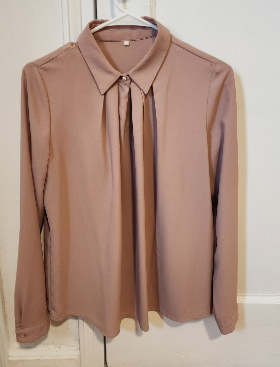 mauve pleated blouse