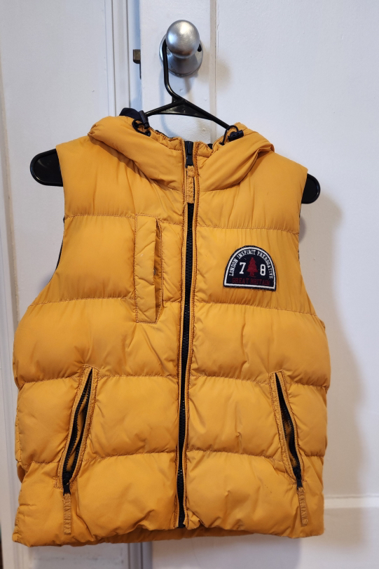 mustard yellow puffer vest