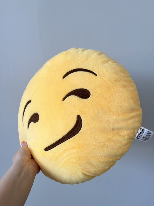Emoji Face Cushion – Winking Smirk | Soft  - Photo 2 view in Manhattan, NY