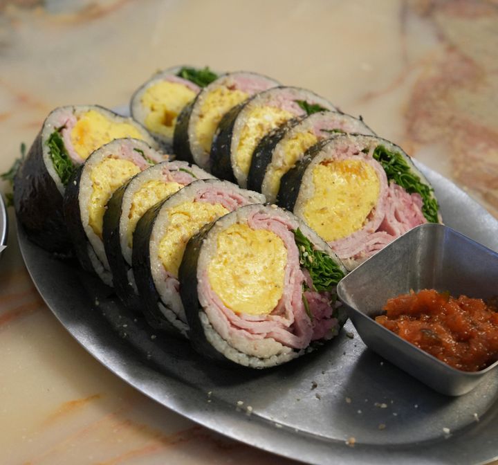 Signature Jambon Kimbap with French jambon, rolled egg, and kimchi jam at Peek In Cafe in Greenpoint, Brooklyn