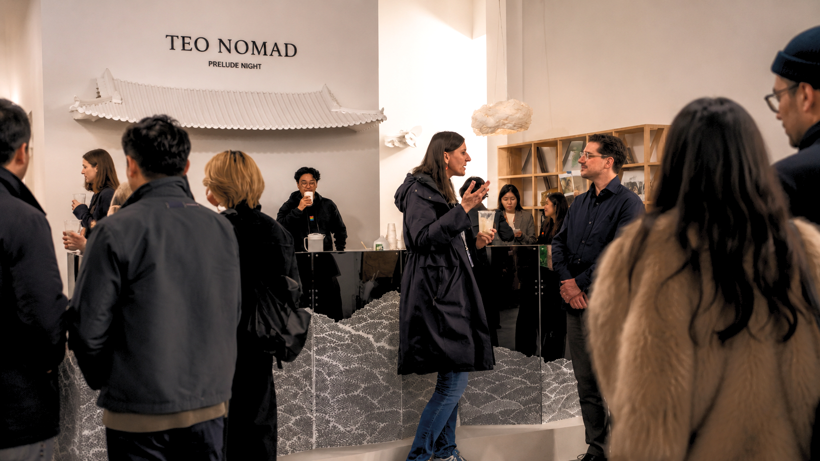 TEO Nomad tearoom environment with Korean pottery and minimalist stone accents